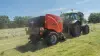 KUHN FB 3135 round baler making silage bales.